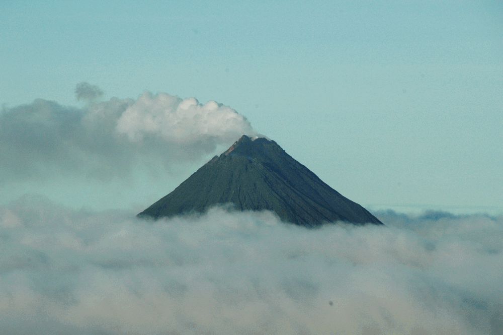 Arenal Volcano puffing away at a safe distance