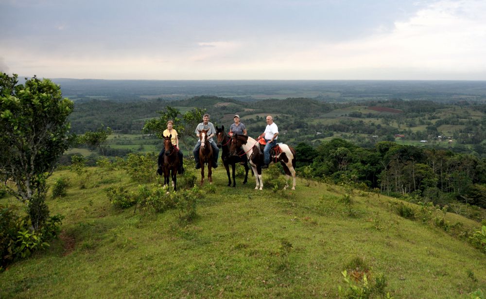 4 riders overlook San Carlos valley