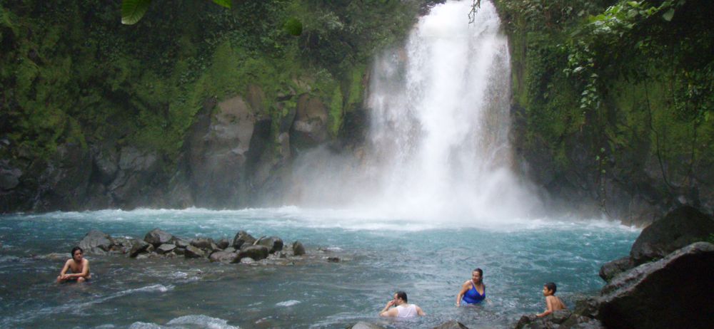 Swimming under Celeste Waterfall Costa Rica 