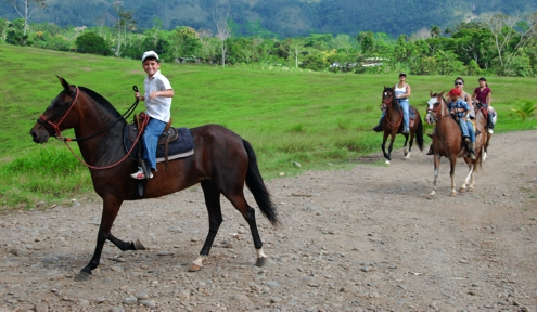 Andres and the family riding in Centaura